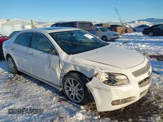 2012 Chevrolet Malibu LTZ with VIN 1G1ZG5E73CF270839, listed as a IAAI auction lot 41284490 with 133,423 mi miles and . Bid and sale history available at DreamBid. Image 1.