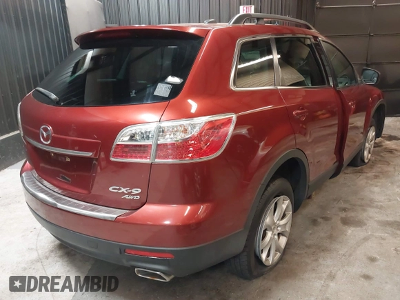2011 Mazda CX-9 Touring with VIN JM3TB3CV7B0313332, listed as a IAAI auction lot 42065595 with 202,494 mi miles. Bid and sale history available at carsss.com. Image 4.