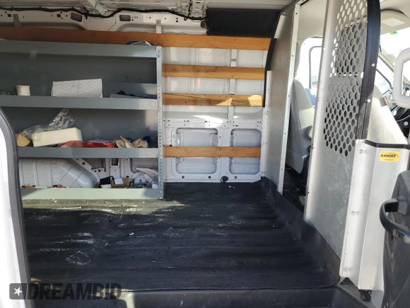 2016 Ford Transit Cargo z VIN 1FTYR1ZMXGKA70849, wystawiony jako Copart lot #50948045 z przebiegiem 93 945 mil mil oraz Szkoda całkowita • Salvage title. Historia ofert i sprzedaży dostępna na DreamBid. Obrazek 11.