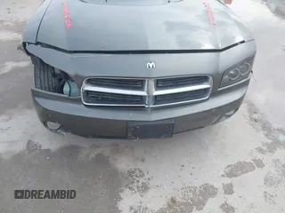 2010 Dodge Charger SXT with VIN 2B3CA3CV0AH234012, listed as a IAAI auction lot 41670267 with 202,182 mi miles and . Bid and sale history available at carsss.com. Image 6.