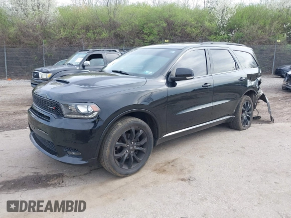 2019 Dodge Durango GT Plus with VIN 1C4RDJDG6KC561099, listed as a IAAI auction lot 41963187 with 104,153 mi miles and . Bid and sale history available at DreamBid. Image 18.