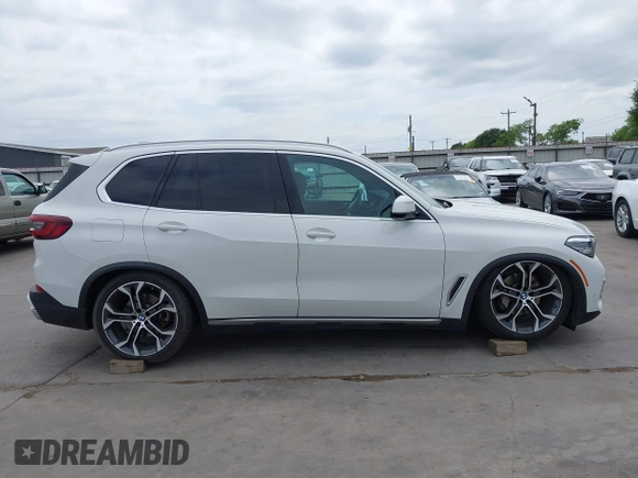 2023 BMW X5 xDrive40i with VIN 5UXCR6C04P9P15756, listed as a IAAI auction lot 42030023 with 40,280 mi miles and . Bid and sale history available at DreamBid. Image 14.