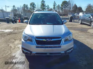 2017 Subaru Forester Touring with VIN JF2SJAWC8HH532348, listed as a IAAI auction lot 41304804 with 104,221 mi miles and . Bid and sale history available at DreamBid. Image 12.
