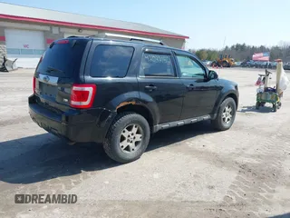 2011 Ford Escape Limited with VIN 1FMCU9EG5BKC33192, listed as a IAAI auction lot 42032152 with 160,745 mi miles. Bid and sale history available at carsss.com. Image 4.