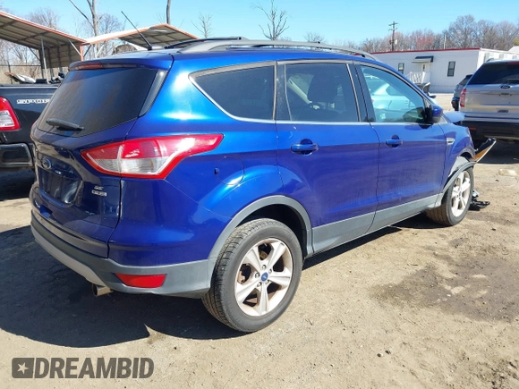 2013 Ford Escape SE with VIN 1FMCU9GX5DUB20394, listed as a IAAI auction lot 41889989 with 121,417 mi miles. Bid and sale history available at carsss.com. Image 4.