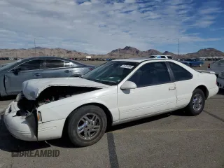 1996 Ford Thunderbird LX z VIN 1FALP62W7TH119284, wystawiony jako Copart lot #71701084 z przebiegiem 239 462 mil mil oraz Szkoda całkowita • Salvage title. Historia ofert i sprzedaży dostępna na DreamBid. Obrazek 1.