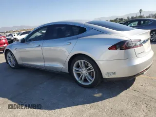 2013 Tesla Model S с VIN 5YJSA1DG7DFP11382, выставлен на аукционе Copart как лот 67097375 с пробегом 55 481 миль миль и Списание • Salvage title. История ставок и продаж доступна на DreamBid. Изображение 2.