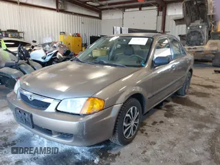 2000 Mazda Protege DX with VIN JM1BJ2225Y0278677, listed as a IAAI auction lot 42056816 with 188,552 mi miles and . Bid and sale history available at DreamBid. Image 17.