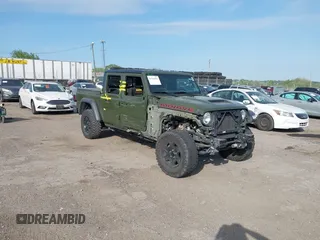 2021 Jeep Gladiator Mojave z VIN 1C6JJTEG2ML565676, wystawiony jako IAAI lot #42165604 z przebiegiem 59 039 mil mil oraz . Historia ofert i sprzedaży dostępna na DreamBid. Obrazek 1.