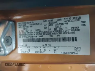 2016 Ford Escape SE with VIN 1FMCU9G95GUB74347, listed as a IAAI auction lot 41560409 with 123,464 mi miles. Bid and sale history available at carsss.com. Image 9.