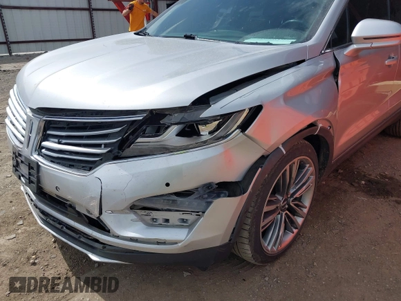 2015 Lincoln MKC with VIN 5LMTJ2AH8FUJ23341, listed as a IAAI auction lot 41828159 with 103,562 mi miles. Bid and sale history available at carsss.com. Image 6.