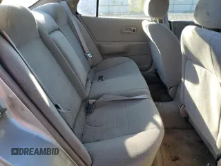 1997 Nissan Altima XE z VIN 1N4BU31DXVC166151, wystawiony jako Copart lot #76300214 z przebiegiem 202 356 mil mil oraz Czysty tytuł • Clean title. Historia ofert i sprzedaży dostępna na DreamBid. Obrazek 10.