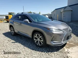2020 Lexus RX 450h z VIN 2T2HGMDA1LC043938, wystawiony jako Copart lot #57683285 z przebiegiem 52 143 mil mil oraz Szkoda całkowita • Salvage title. Historia ofert i sprzedaży dostępna na DreamBid. Obrazek 13.