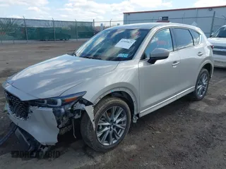 2024 Mazda CX-5 2.5 S Premium Package with VIN JM3KFBDL5R0465272, listed as a IAAI auction lot 41959823 with 12,777 mi miles. Bid and sale history available at carsss.com. Image 2.