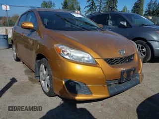 2009 Toyota Matrix S with VIN 2T1LE40E89C009775, listed as a IAAI auction lot 42086039 with 220,832 mi miles. Bid and sale history available at carsss.com. Image 6.