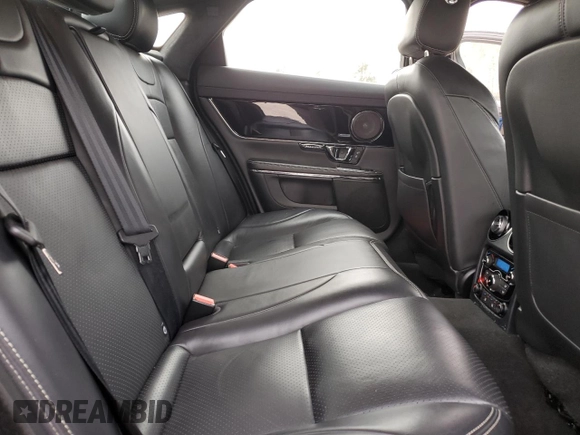 2015 Jaguar XJ with VIN SAJWA1CZ1F8V85402, listed as a Copart auction lot 86717734 with 201,249 mi miles and Salvage Title. Bid and sale history available at carsss.com. Image 10.