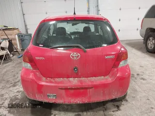 2009 Toyota Yaris with VIN JTDJT903695262292, listed as a IAAI auction lot 41636204 with 157,986 mi miles. Bid and sale history available at carsss.com. Image 16.