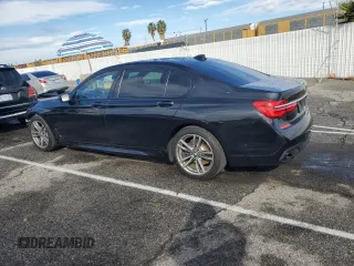 2017 BMW 7 Series 740i with VIN WBA7E2C59HG739693, listed as a Copart auction lot 42599835 with 90,061 mi miles and Salvage Title. Bid and sale history available at carsss.com. Image 2.