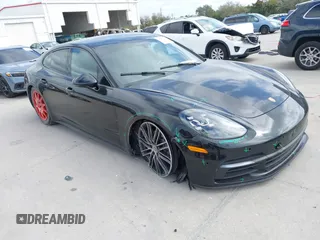 2019 Porsche Panamera with VIN WP0AA2A73KL101303, listed as a IAAI auction lot 41562312 with 67,549 mi miles and . Bid and sale history available at DreamBid. Image 1.