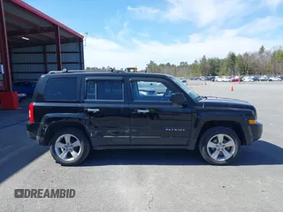 2015 Jeep Patriot High Altitude with VIN 1C4NJRFB4FD425660, listed as a IAAI auction lot 41821761 with 90,774 mi miles and . Bid and sale history available at carsss.com. Image 13.