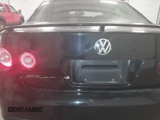 2008 Volkswagen Jetta z VIN 3VWRA71K58M183060, wystawiony jako IAAI lot #41700707 z przebiegiem 174 555 mil mil oraz . Historia ofert i sprzedaży dostępna na DreamBid. Obrazek 6.