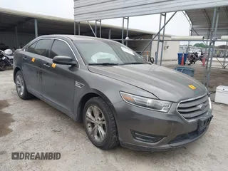2015 Ford Taurus SEL z VIN 1FAHP2E85FG209085, wystawiony jako IAAI lot #41944532 z przebiegiem 143 850 mil mil oraz . Historia ofert i sprzedaży dostępna na DreamBid. Obrazek 1.
