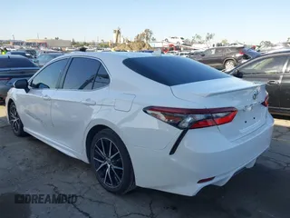 2023 Toyota Camry SE with VIN 4T1G11AK2PU799683, listed as a IAAI auction lot 41969271 with 32,332 mi miles and . Bid and sale history available at DreamBid. Image 3.