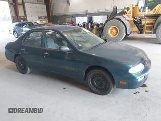 1996 Nissan Altima XE with VIN 1N4BU31D4TC139105, listed as a IAAI auction lot 40241213 with 115,817 mi miles and . Bid and sale history available at DreamBid. Image 1.