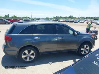 2011 Acura MDX with VIN 2HNYD2H26BH507406, listed as a IAAI auction lot 42195019 with 180,081 mi miles and . Bid and sale history available at carsss.com. Image 13.