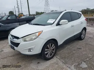 2013 Hyundai Tucson GLS with VIN KM8JU3AC8DU599937, listed as a IAAI auction lot 41398687 with 207,048 mi miles. Bid and sale history available at carsss.com. Image 2.