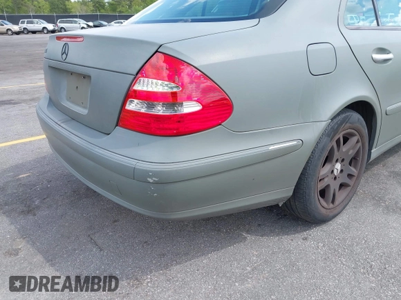 2003 Mercedes-Benz E-Class 3.2L with VIN WDBUF65J83A124342, listed as a IAAI auction lot 41951596 with 185,094 mi miles. Bid and sale history available at carsss.com. Image 6.
