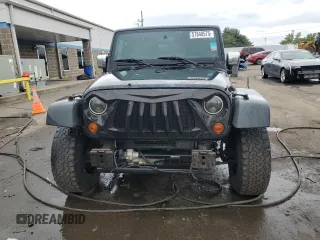 2008 Jeep Wrangler Unlimited Rubicon with VIN 1J4GA691X8L590979, listed as a Copart auction lot 57840575 with 195,458 mi miles and Salvage title. Bid and sale history available at DreamBid. Image 5.