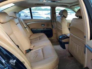 2005 BMW 7 Series 745i with VIN WBAGL63545DP75494, listed as a Copart auction lot 72359904 with 143,878 mi miles and Salvage title. Bid and sale history available at DreamBid. Image 10.