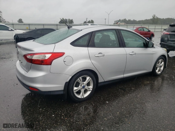2014 Ford Focus SE with VIN 1FADP3F22EL103956, listed as a Copart auction lot 71005344 with 102,509 mi miles and Salvage Title. Bid and sale history available at carsss.com. Image 3.