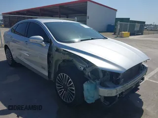 2017 Ford Fusion Energi SE with VIN 3FA6P0PU8HR242177, listed as a IAAI auction lot 42057898 with 119,435 mi miles. Bid and sale history available at carsss.com. Image 1.