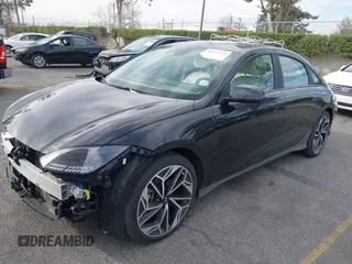 2023 Hyundai IONIQ 6 SEL with VIN KMHM34AA6PA030658, listed as a IAAI auction lot 41271375 with 19,544 mi miles. Bid and sale history available at carsss.com. Image 2.