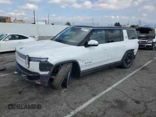 2025 Rivian R1S Adventure with VIN 7PDSGBBA1SN051768, listed as a Copart auction lot 43838115 with 4,875 mi miles and Salvage Title. Bid and sale history available at carsss.com. Image 1.