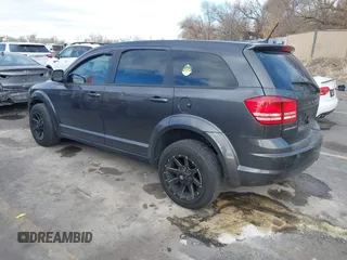 2014 Dodge Journey American Value Pkg with VIN 3C4PDCAB5ET235427, listed as a IAAI auction lot 41056216 with 164,740 mi miles. Bid and sale history available at carsss.com. Image 3.