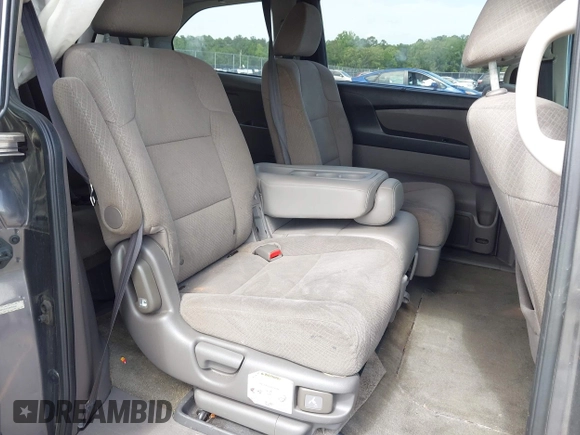 2015 Honda Odyssey EX z VIN 5FNRL5H41FB059667, wystawiony jako IAAI lot #42274039 z przebiegiem 196 687 mil mil oraz . Historia ofert i sprzedaży dostępna na DreamBid. Obrazek 8.