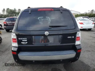 2008 Mercury Mariner Premier z VIN 4M2CU97168KJ31769, wystawiony jako Copart lot #50248325 z przebiegiem 133 450 mil mil oraz Szkody całkowita. Historia ofert i sprzedaży dostępna na DreamBid. Obrazek 6.