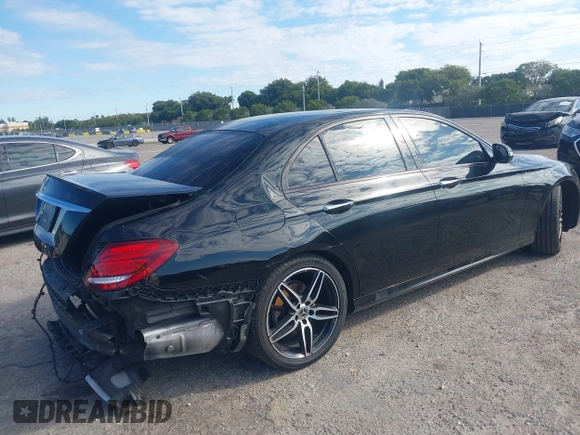 2019 Mercedes-Benz E-Class E 300 with VIN WDDZF4JB9KA586634, listed as a IAAI auction lot 41685266 with 97,296 mi miles. Bid and sale history available at carsss.com. Image 4.