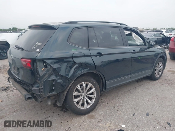 2019 Volkswagen Tiguan S with VIN 3VV1B7AXXKM002312, listed as a IAAI auction lot 42282809 with 80,781 mi miles and . Bid and sale history available at DreamBid. Image 4.