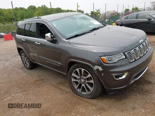 2017 Jeep Grand Cherokee Overland with VIN 1C4RJFCG6HC964435, listed as a IAAI auction lot 42407567 with 113,760 mi miles and . Bid and sale history available at DreamBid. Image 1.