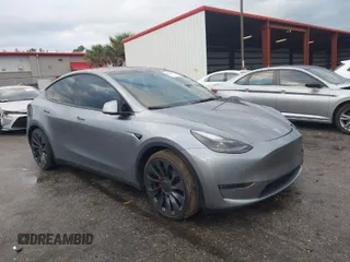 2024 Tesla Model Y Performance with VIN 7SAYGDEF3RA307468, listed as a IAAI auction lot 41805853 with 10,377 mi miles and . Bid and sale history available at DreamBid. Image 1.