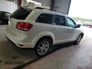 2013 Dodge Journey SXT with VIN 3C4PDDBG1DT521452, listed as a Copart auction lot 62660785 with 177,945 mi miles and Salvage title. Bid and sale history available at DreamBid. Image 3.