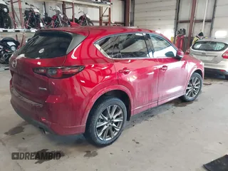 2024 Mazda CX-5 2.5 S Premium Package with VIN JM3KFBDL8R0470661, listed as a IAAI auction lot 41410715 with 14,100 mi miles. Bid and sale history available at carsss.com. Image 4.