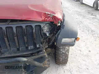 2021 Jeep Wrangler Unlimited Willys with VIN 1C4HJXDN6MW815448, listed as a IAAI auction lot 41459304 with 52,474 mi miles and . Bid and sale history available at DreamBid. Image 6.