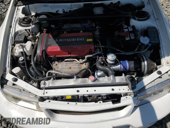 1998 Mitsubishi Lancer z VIN 000000CP9A0001997, wystawiony jako Copart lot #68862654 z przebiegiem 164 292 mil mil oraz Szkoda całkowita • Salvage title. Historia ofert i sprzedaży dostępna na DreamBid. Obrazek 11.