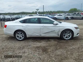 2015 Chevrolet Impala LT with VIN 1G1125S30FU140935, listed as a IAAI auction lot 42153988 with 147,828 mi miles and . Bid and sale history available at DreamBid. Image 13.