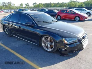 2012 Audi A8 z VIN WAUAVAFD0CN018847, wystawiony jako IAAI lot #42061886 z przebiegiem 118 979 mil mil oraz . Historia ofert i sprzedaży dostępna na DreamBid. Obrazek 1.